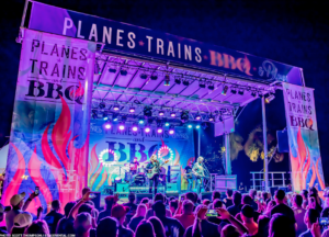 Stageline SL100 mobile stage at an outdoor live music event