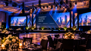 Corporate event production with LED video walls, stage lighting and professional AV setup